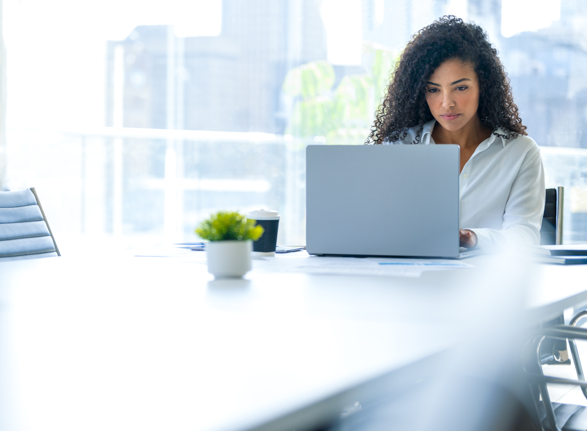 Professional woman focused on managing client documents and workflows using DociShield